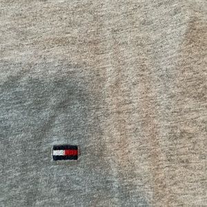 Gray short sleeve Tommy Hilfiger shirt.